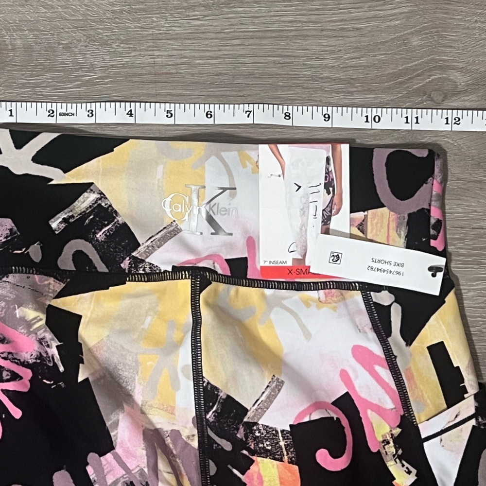 Calvin Klein Black and Pink Bike Shorts with Abstract Print - Picture 6 of 9